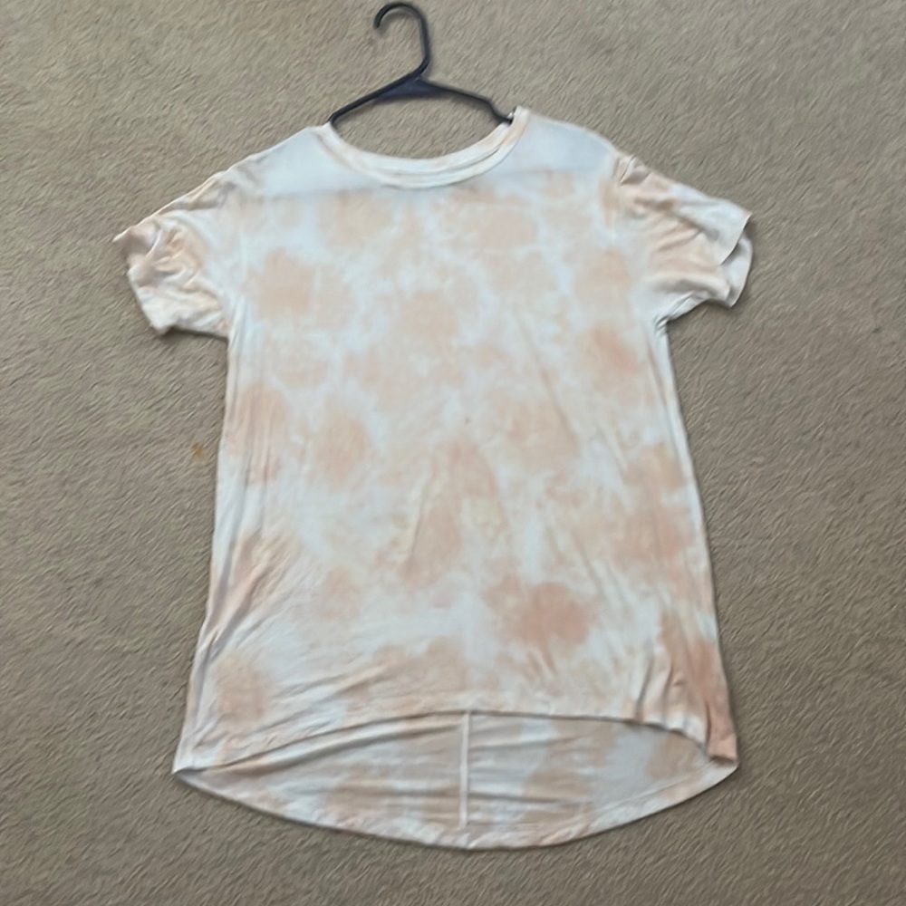 Oversized short sleeve light pink and white tie dye tank.